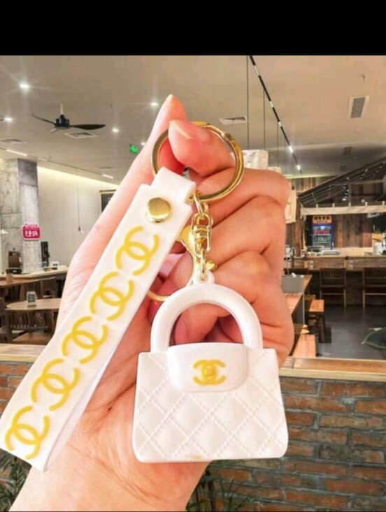 The Unbranded Brand Accessories - Chanel White Quilted Mini Bag Keychain with Strap
